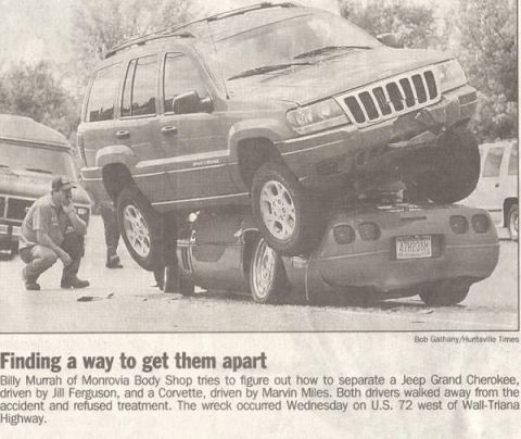 1976 Chevrolet Corvette - A Jeep Grand Cherokee is on top of a Chevrolet Corvette following a highway accident. A body shop worker assesses the situation.