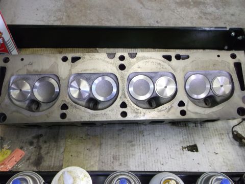 1967 Ford Mustang - Close-up view of an engine cylinder head, showing the intake and exhaust valves.