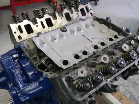 1967 Ford Mustang - Engine block and cylinder heads with valve springs and pushrods visible.