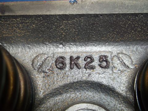 1967 Ford Mustang - Close-up of an engine component showing cast-in numbers and a date stamp.
