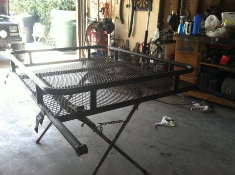 1993 Jeep Cherokee - Custom roof rack assembly on a stand, likely for off-road vehicles.
