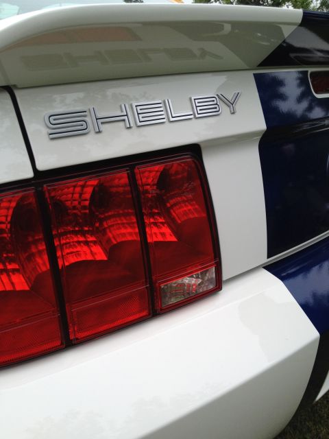 2007 Ford Mustang - Close-up of the rear of a Shelby Mustang, highlighting its distinctive taillights and badging.