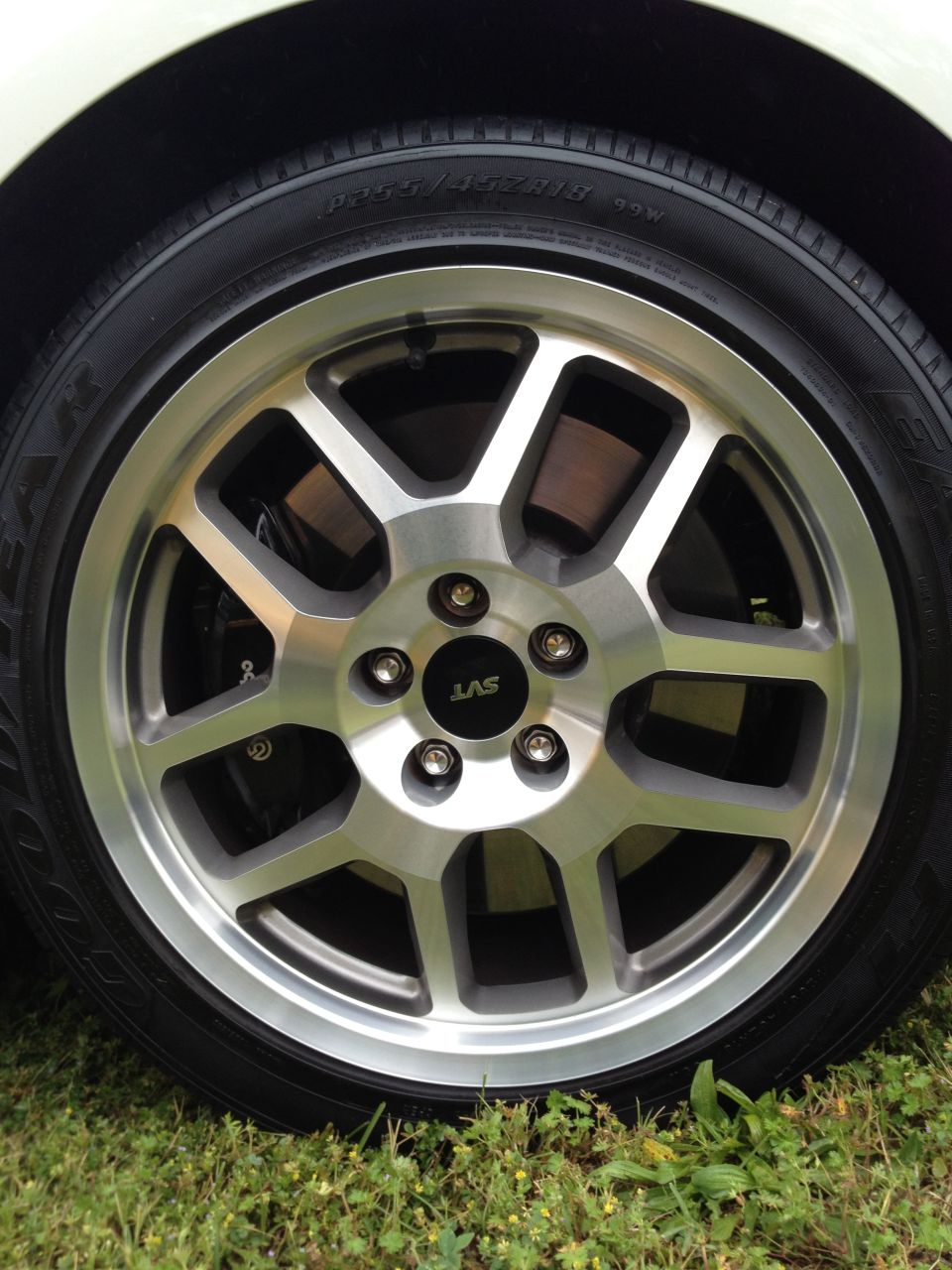 Close-up of a silver SVT wheel with black brake caliper visible
