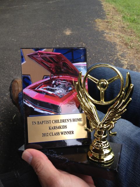 2007 Ford Mustang - A trophy awarded to TN Baptist Children's Home Kars4Kids as the 2012 Class Winner, a photo of a classic car's engine.