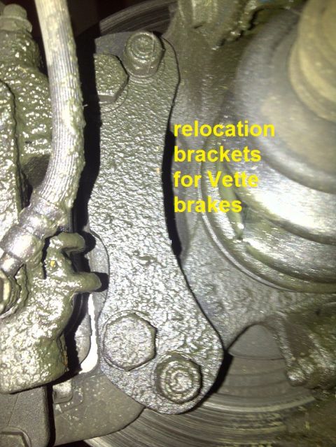 1995 Ford Probe - This image shows a relocation bracket designed for Vette brakes, attached to a vehicle's braking system components.
