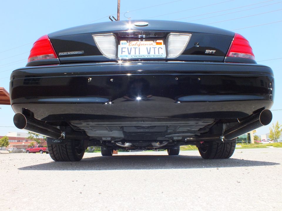 Underside rear view of black Ford Crown Victoria SVT with dual exhaust and FVTL VTC plate