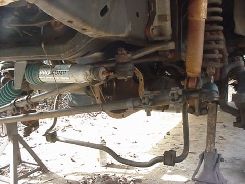 1979 Ford Bronco - The vehicle's undercarriage is visible, steering and suspension parts, with a Pro Comp shock absorber.