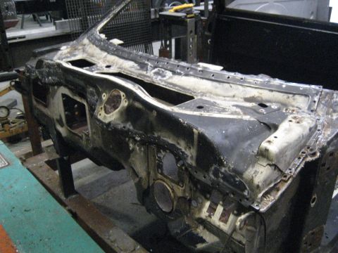 1973 Ford Ranchero - Firewall and dashboard structure of a car in a workshop, possibly for rebuild.