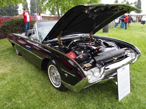 1994 Ford Bronco - Black 1959 Ford Thunderbird convertible displayed with its hood open, revealing the engine bay.
