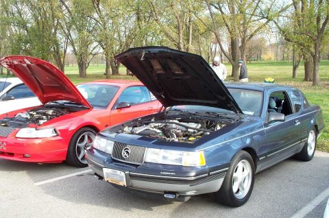 1998 Ford Crown Victoria - A supercharged, 5-spd Cougar.