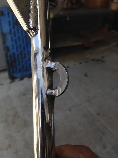 1995 Ford Bronco - A close-up shows a welded metal loop on a shiny bracket, with a Supermotors.net watermark at the bottom.