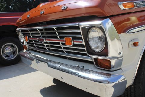 1969 Ford F-250 - Close-up of a 1967 Ford F-Series truck's front end, showing the grille and bumper details.