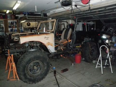 1961 International Scout 800 - This vehicle appears to be a project in progress, with its body removed and a roll cage installed.