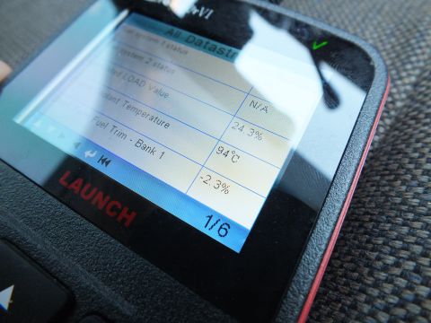 2003 Ford Crown Victoria - Handheld Launch diagnostic scanner displaying live engine datastream on page 1 of 6