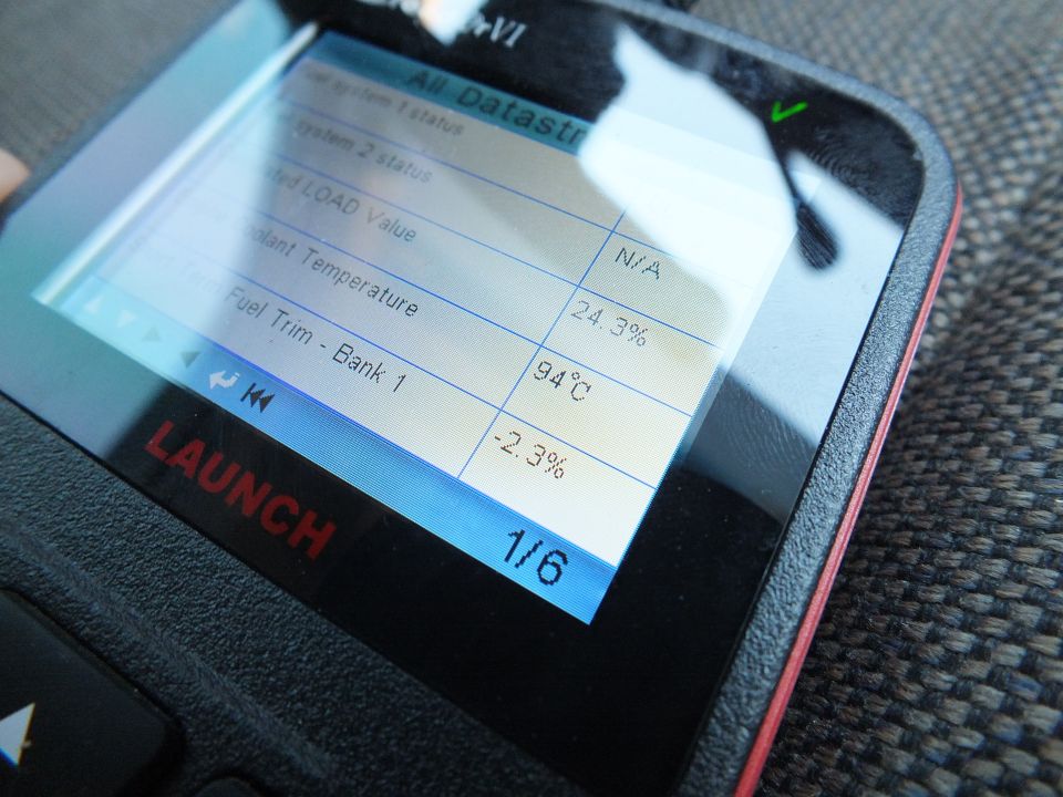 Launch OBD scan tool screen showing All Datastream readings, coolant 94C, fuel trim values