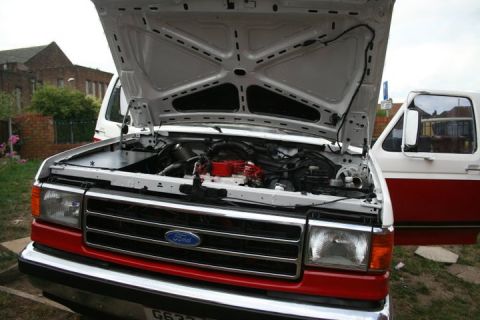 1989 Ford Bronco - The front grille and headlight design suggest this is a Ford F-Series truck from the late 1980s, not a Bronco.