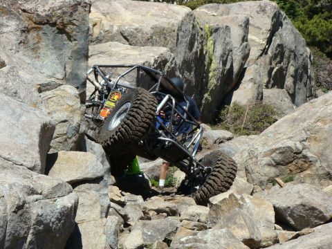 1989 Ford Bronco - Custom off-road buggy tackling a challenging rock crawling course.