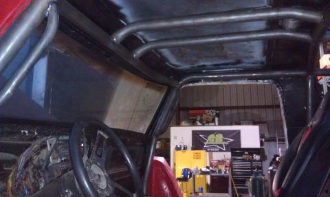 1978 Ford Bronco - Custom roll cage installed inside the interior of a 1978 Ford Bronco, a racing seat and dashboard wiring.