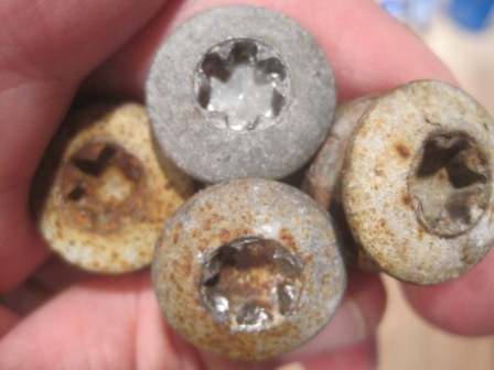 1993 Ford Bronco - These lug nuts show significant rust and wear, indicating they are not new parts.