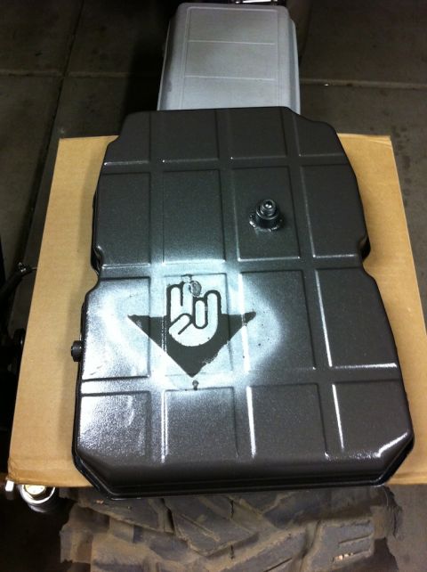 2010 Dodge Challenger - Oil pan with a spray-painted hand symbol and arrow.