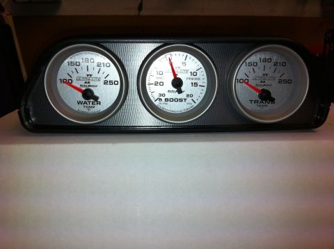 2010 Dodge Challenger - This gauge cluster displays water temperature, boost pressure, and transmission temperature readings.
