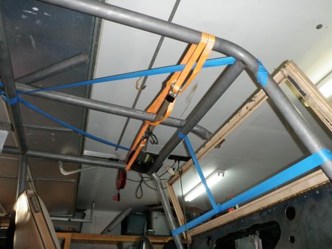 1961 International Scout 800 - A custom metal roll cage is visible, held in place with straps.
