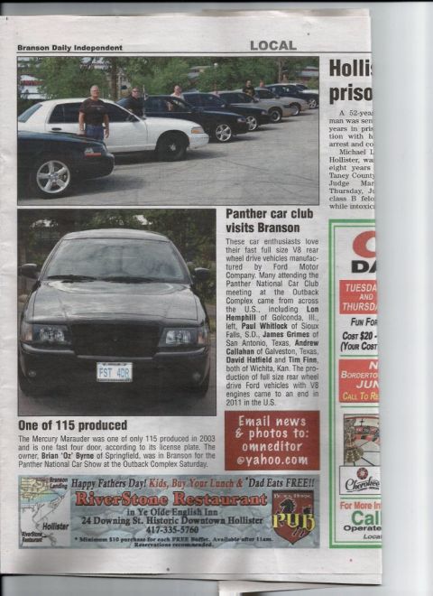 2000 Mercury Grand Marquis - A black sedan, identified as one of 115 produced Mercury Marauders from 2003, is shown in a front view with its license plate visible.