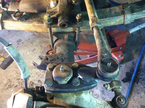 1983 Chevrolet C/K Pickup - This is a close-up view of the steering linkage and front suspension components of a vehicle.