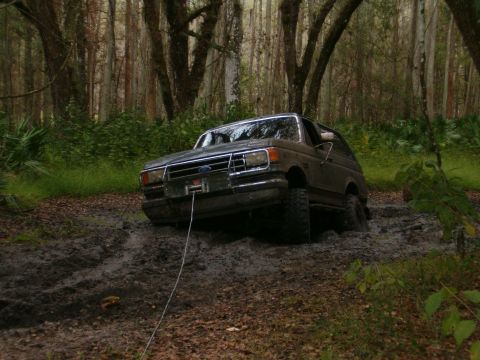 1991 Ford Bronco - Sunk in pretty bad mud. Had to try the winch, was winching when somebody came and offered to pull me. Along with his 6in wide tow strap and…