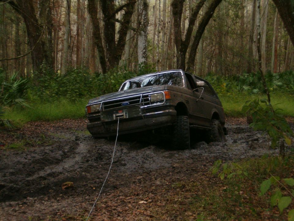 Sunk in pretty bad mud.  Had to try the winch, was winching when somebody came and offered to pull me.  Along with his 6in wide tow strap and somebody operating my winch I got out.  Had around 10 people watching and a FWC officer.  Was the second day of hunting season so many people around.