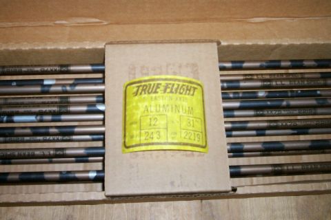 1993 Ford Bronco - A box of True Flight aluminum arrows, Easton XX75, with specifications 12/24.3 and 31"/2219, is shown.