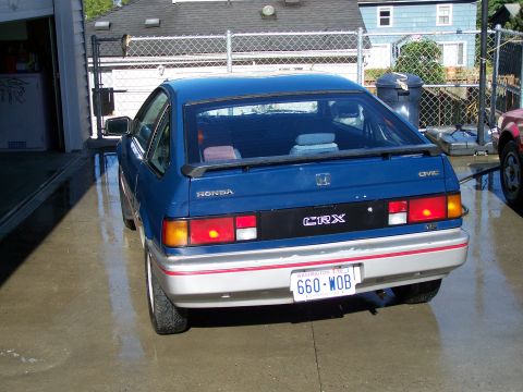 1988 Suzuki Samurai - Rear view of a blue 1988 Honda CRX, showing its distinctive taillights and CRX badging.