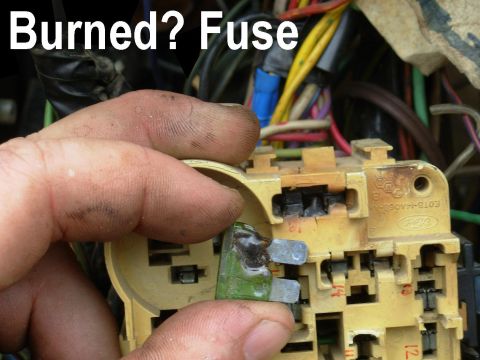1983 Ford Bronco - This fuse got hot enough to burn the plastic, but didn't blow because the circuit didn't draw more than the fuse's capacity (~33A). It drew…