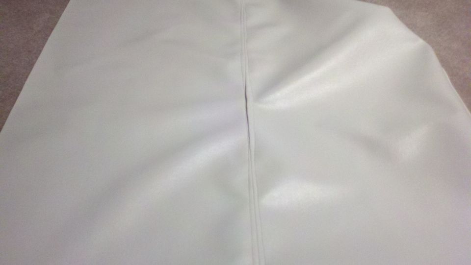 White vinyl material with a central seam