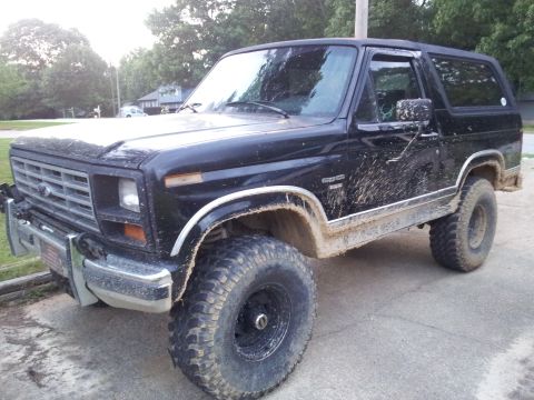 1986 Ford Bronco - This black Ford Bronco appears to be from the early 1980s, not 1986, based on its body style.