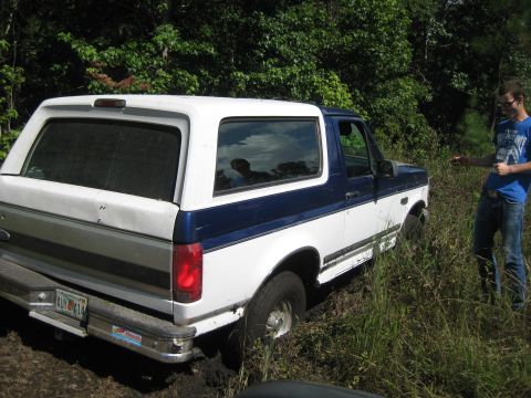 1994 Ford Bronco - This 1994 Ford Bronco is stuck in the mud off-road.