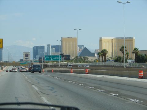 1992 Ford Taurus - Driving on a highway with the Las Vegas skyline in the distance, the Luxor Pyramid and Mandalay Bay hotel.