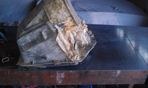 1978 Ford Bronco - This AC box shows significant damage and torn insulation, suggesting it is a replacement part.