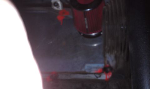1978 Ford Bronco - A red air filter is visible in the engine bay, with some red markings on surrounding components.