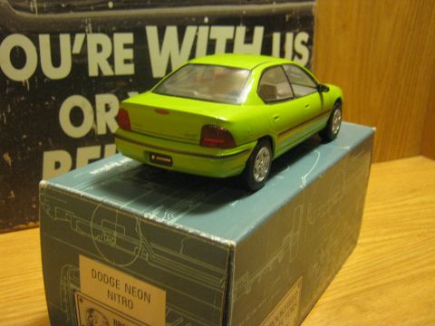 2010 Mitsubishi Outlander - Model car of a Dodge Neon Nitro displayed on its original packaging.