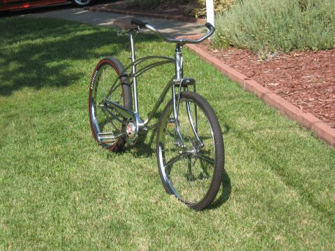 1994 Ford Bronco - A custom cruiser bicycle with chrome frame and handlebars sits on a lawn.