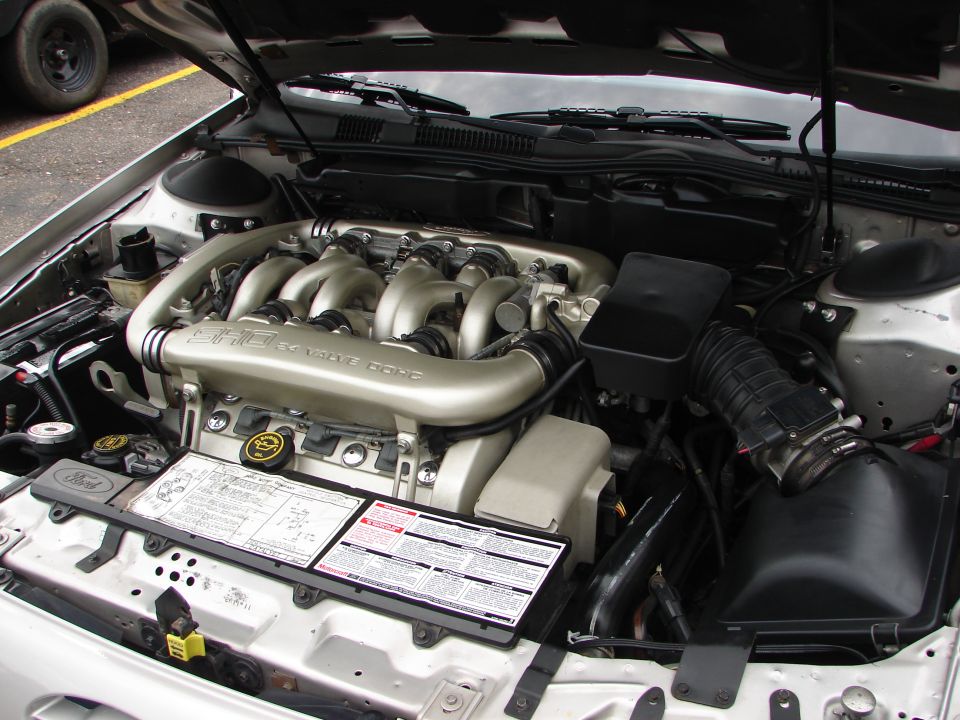 1992 Ford Taurus SHO engine bay with V6 engine and intake system visible