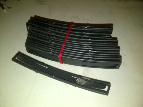1989 Ford Bronco - A bundle of black rubber seals is shown, with one seal separated from the stack.