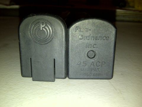 1989 Ford Bronco - Two gun magazines are shown, one marked with Para-Ordnance Inc. and 45 ACP.