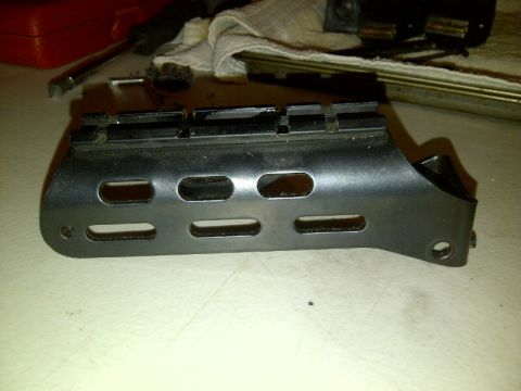 1989 Ford Bronco - This is a gun scope mount with slotted openings and a rail. The registry label may be incorrect.