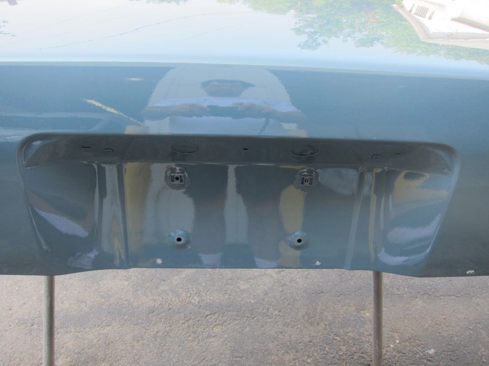 Rear of a car, showing license plate area and trunk lid
