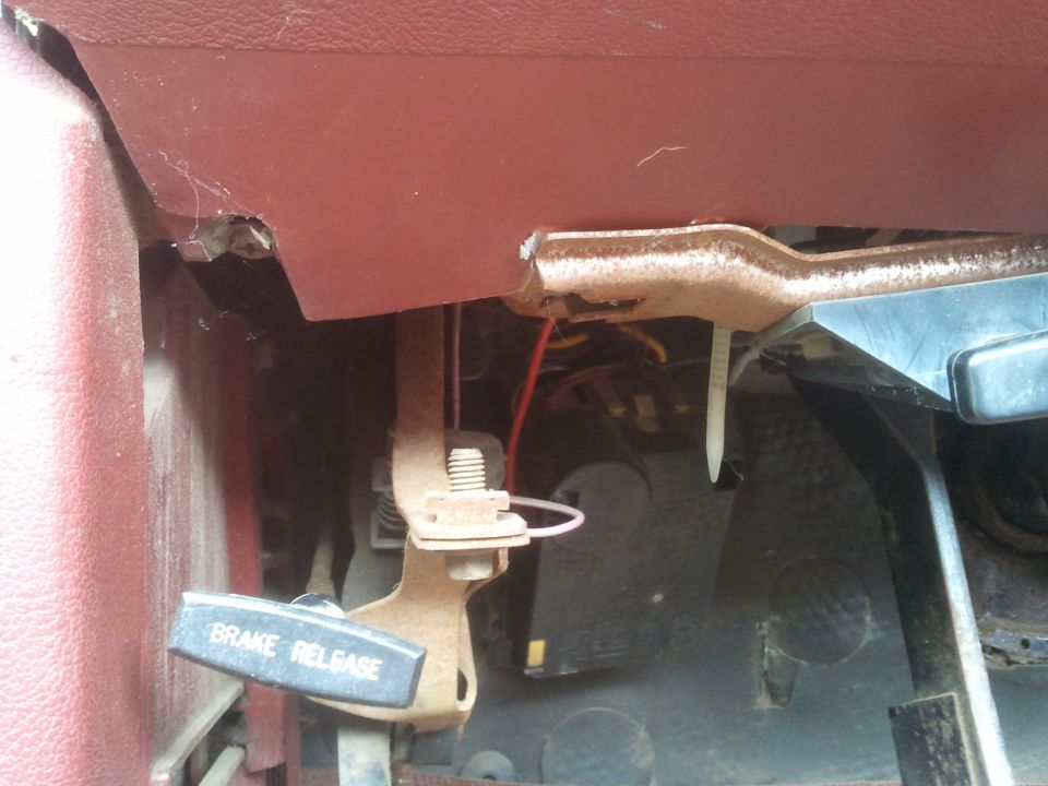 1984 Ford Bronco interior showing brake release lever and pedals