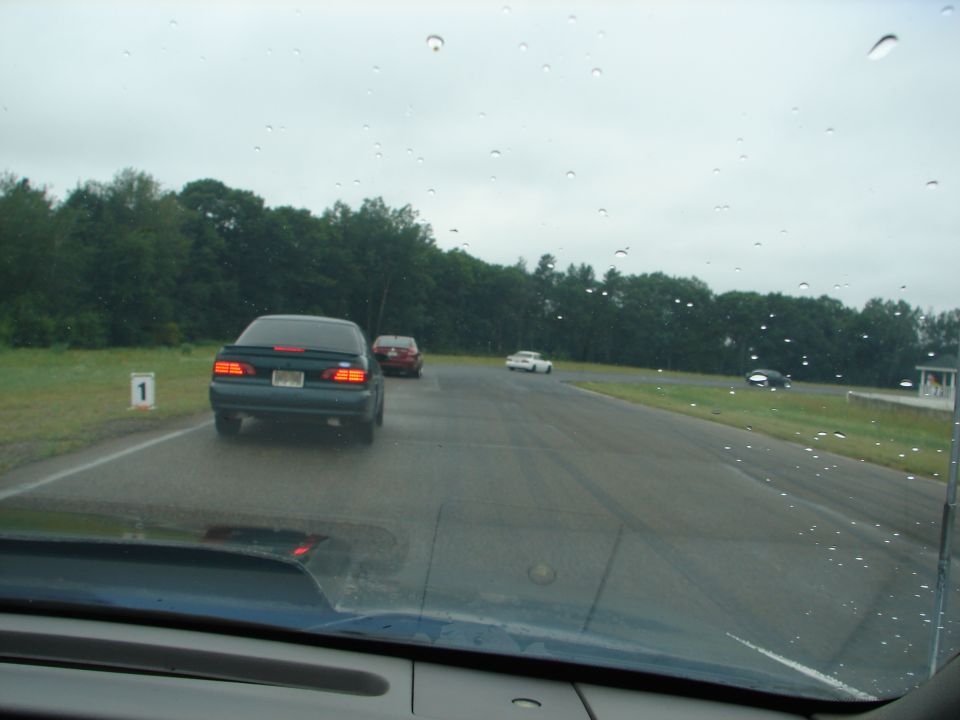 1992 Ford Taurus rear view on wet track