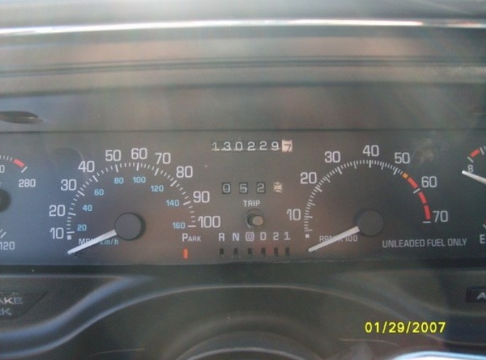 Dashboard gauges with odometer reading 130229.7 and trip meter 052