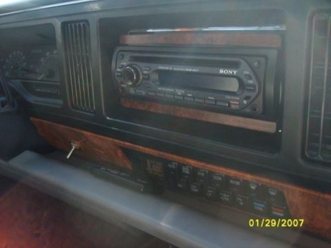 2000 Mercury Grand Marquis - Interior view of a car's dashboard a Sony radio and climate controls.